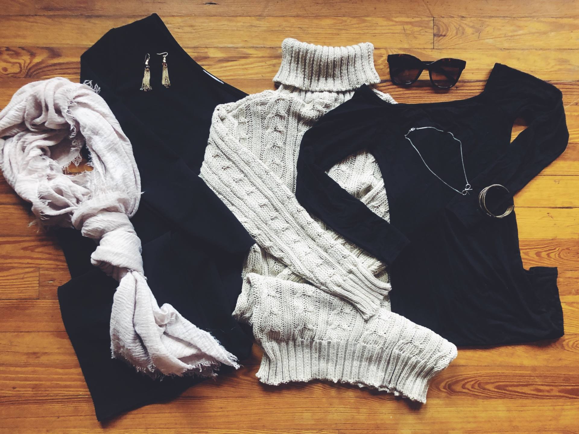 Flat lay design of femme luxe clothing by the boho traveller
